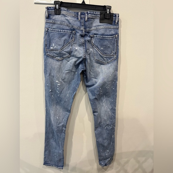 Zumies Empyre Mens size 32 distress & bleach stain tapered Jeans - Picture 3 of 5